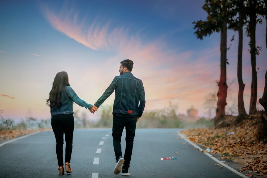A couple walking on the road